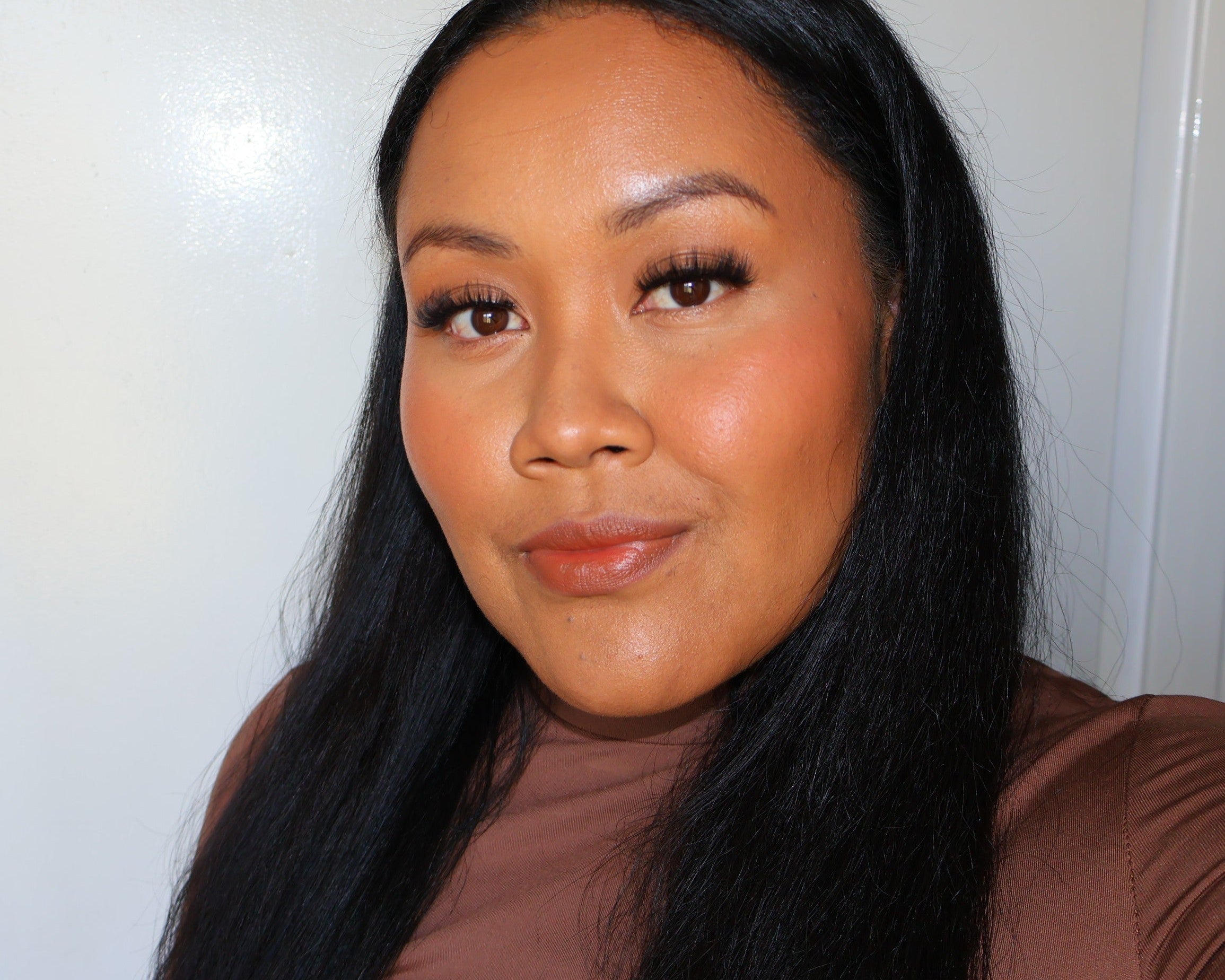 Founder of Kaliyanei Lashes with soft glam makeup and everyday lash style