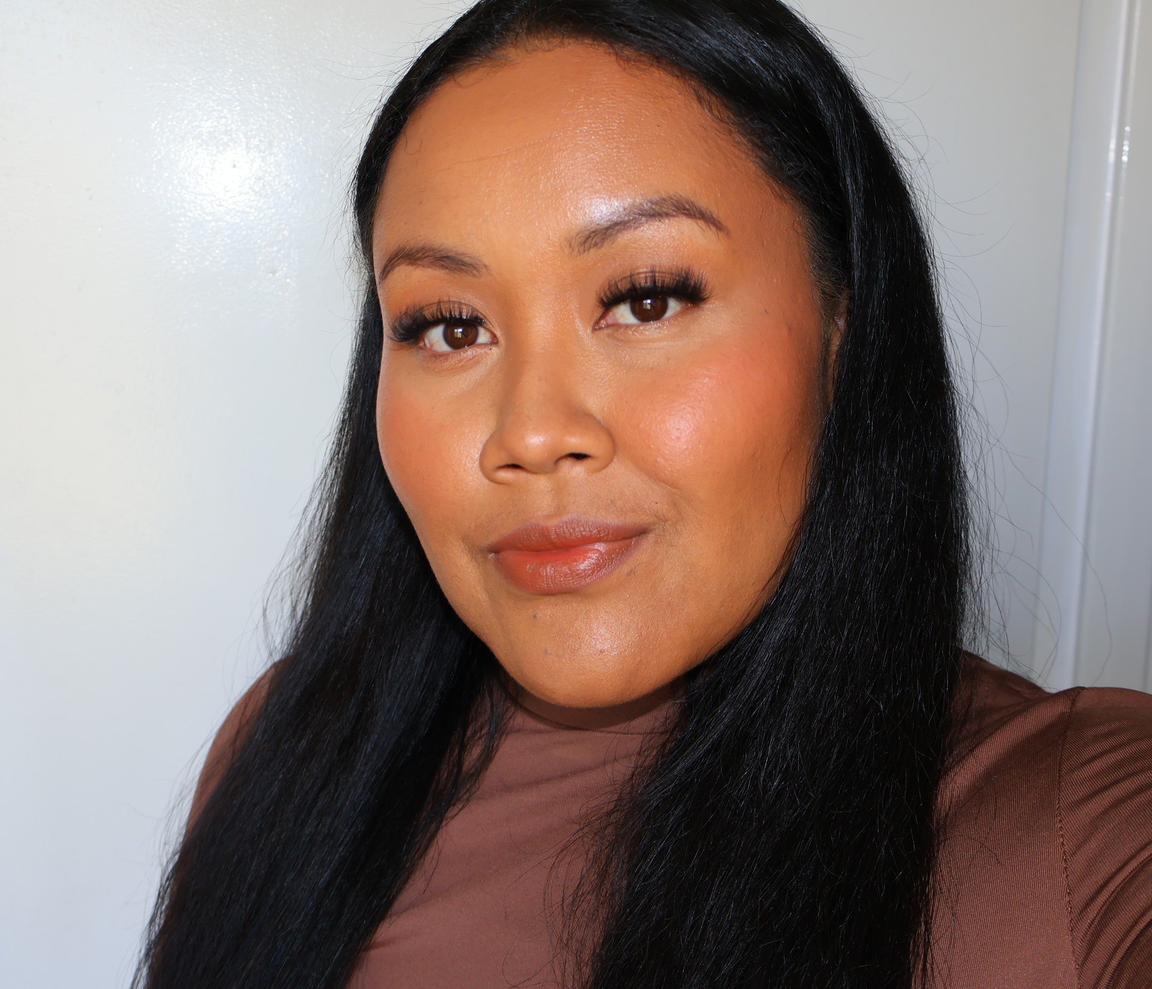 Founder of Kaliyanei Lashes with soft glam makeup and everyday lash style