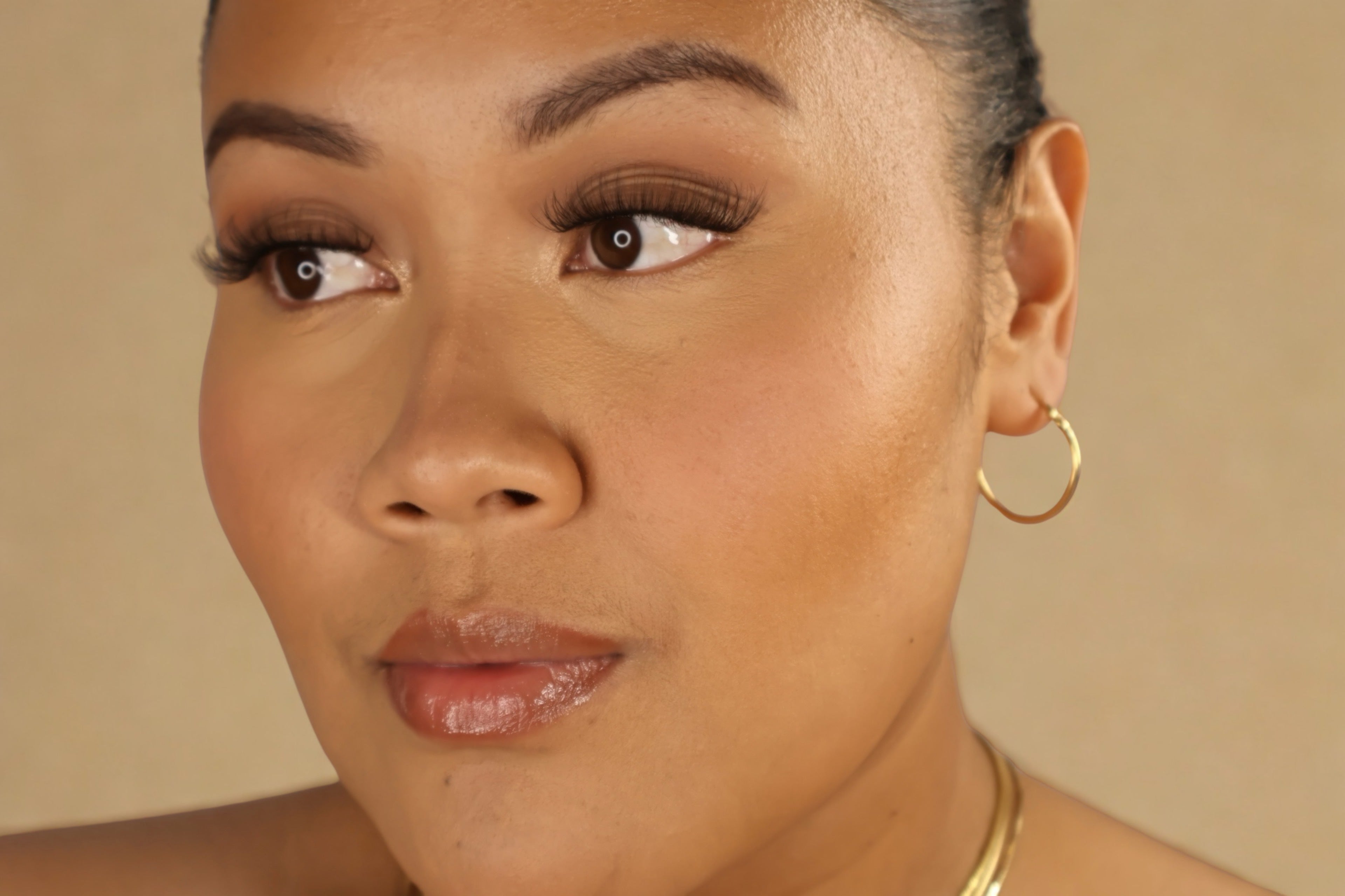 Soft glam makeup look featuring natural Kaliyanei strip lashes.