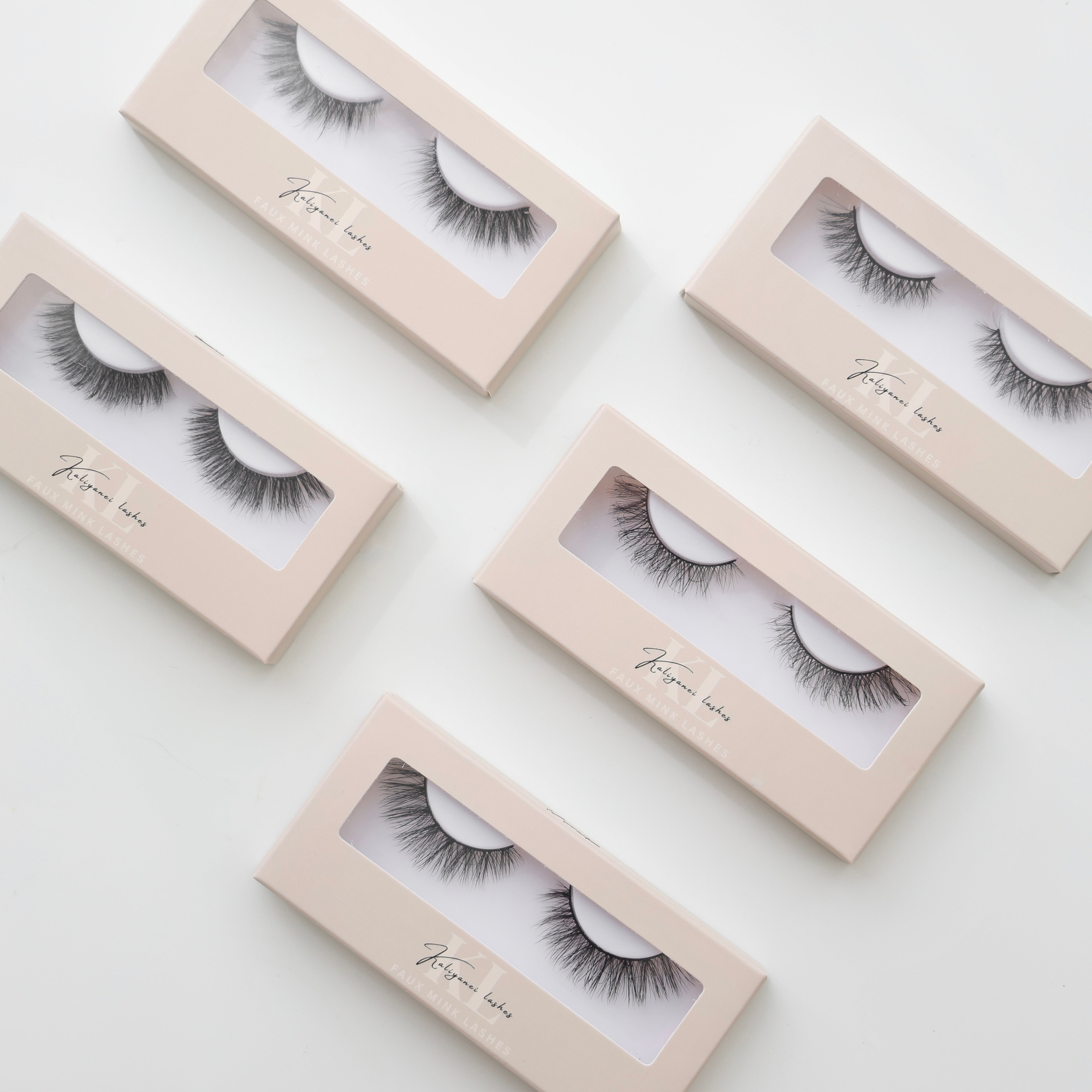 Pair Strip Lash by Kaliyanei Lashes – Flatlay of Lash Boxes in Beige Packaging on Light Background