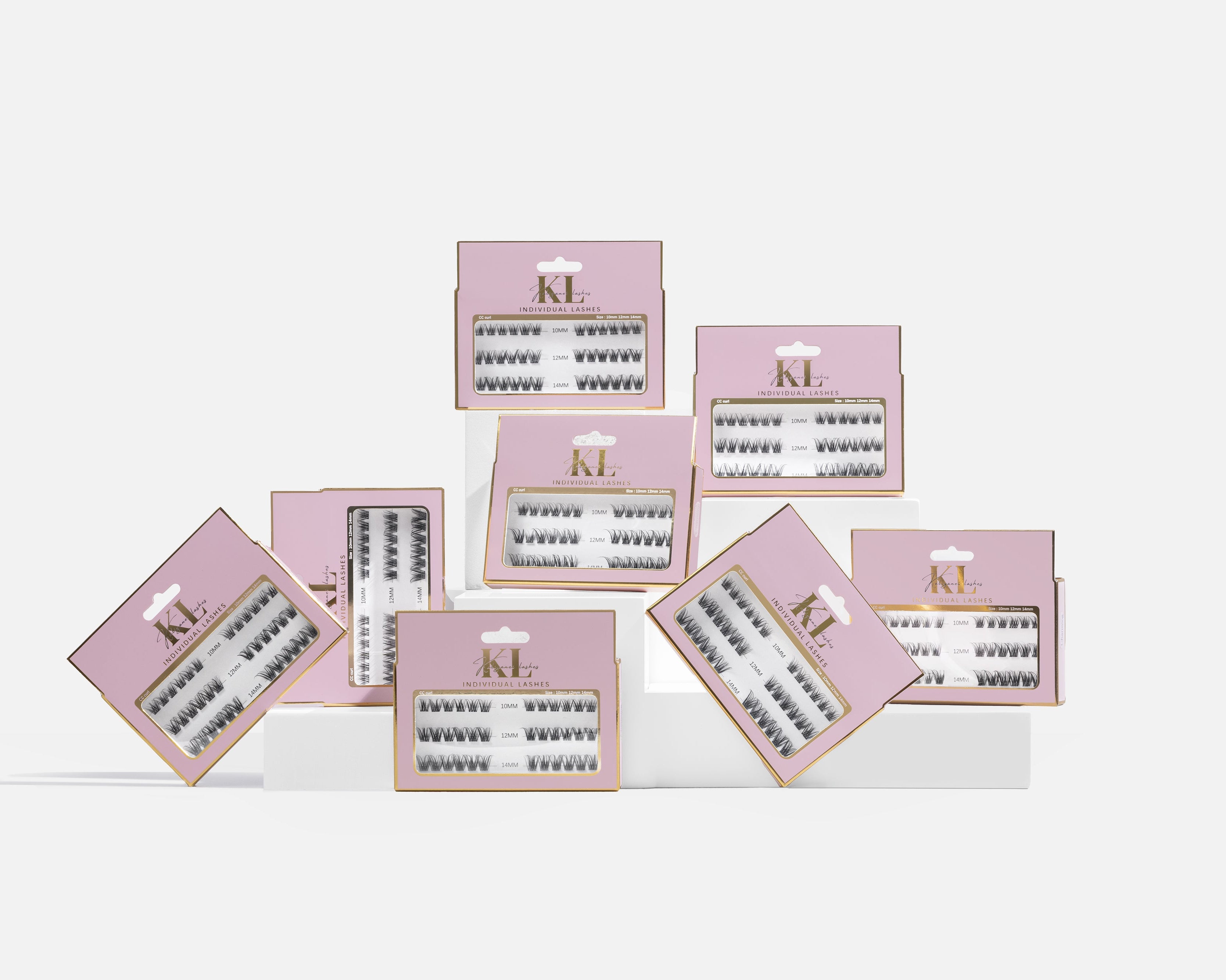 Pro Lash Artistry Kit individual lash clusters in pink premium packaging on white background